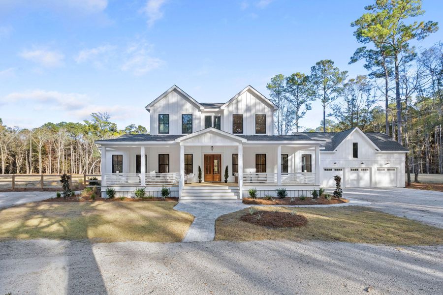 Front exterior of a new home in , Johns Island, SC, highlighting curb appeal (Image 1).