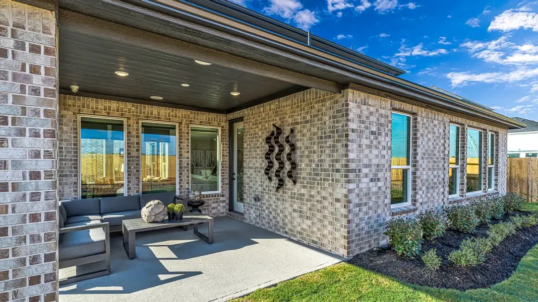 Exterior details and patio area of a home in Avalon at Cypress, Cypress (Image 4).