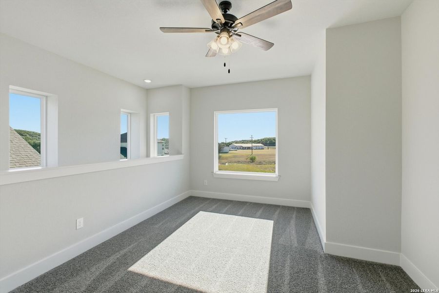 Spacious, unfurnished interior of a new home in Crown Ridge Manor, San Antonio (Image 17).