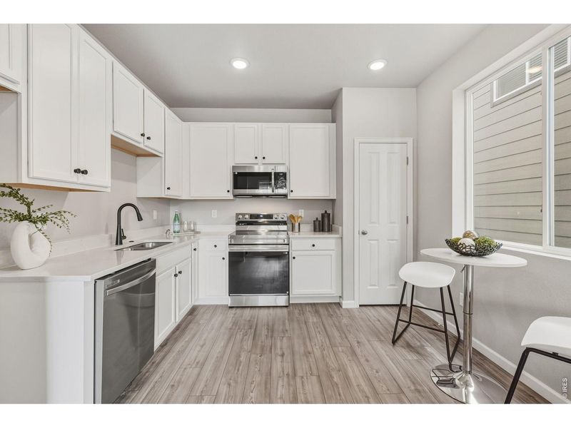 Furnished interior view inside a new home in Spring Valley, Longmont (Image 9).