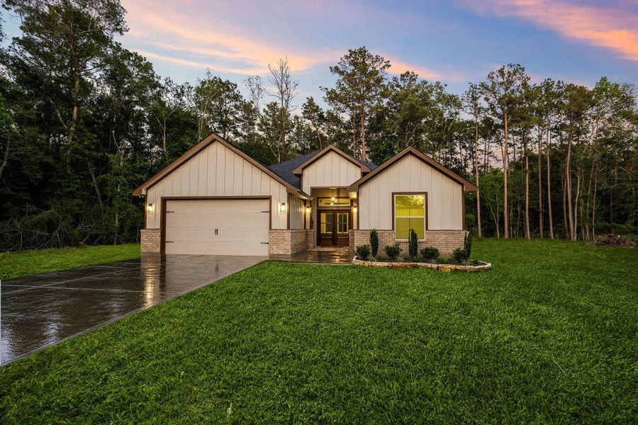 Front exterior of a new home in , Porter, TX, highlighting curb appeal (Image 21).