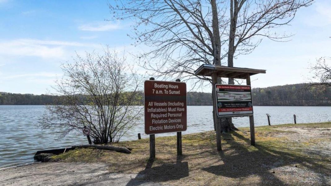 Front exterior of a new home in Fairhaven, Lithia Springs, GA, highlighting curb appeal (Image 30). Front exterior of a new home in Fairhaven, Lithia Springs, GA, highlighting curb appeal (Image 30).