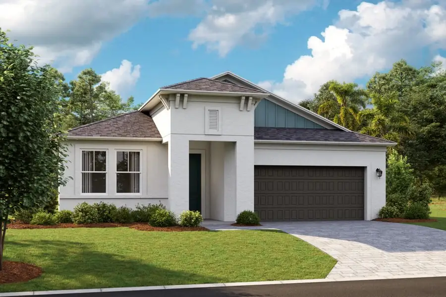 Front exterior of a new home in Pasadena Woods, Wesley Chapel, FL, highlighting curb appeal (Image 2). Front exterior of a new home in Pasadena Woods, Wesley Chapel, FL, highlighting curb appeal (Image 2).