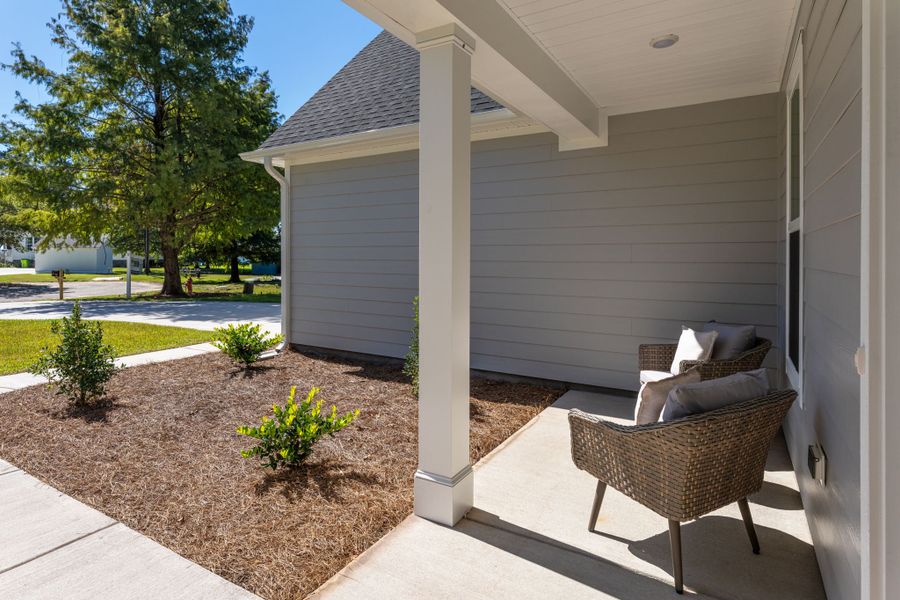 Exterior details and patio area of a home in The Bluffs at Lake Waccamaw, Lake Waccamaw (Image 28).