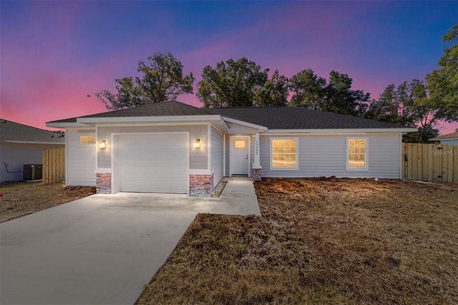 Front exterior of a new home in , Dunnellon, FL, highlighting curb appeal (Image 18). Front exterior of a new home in , Dunnellon, FL, highlighting curb appeal (Image 18).