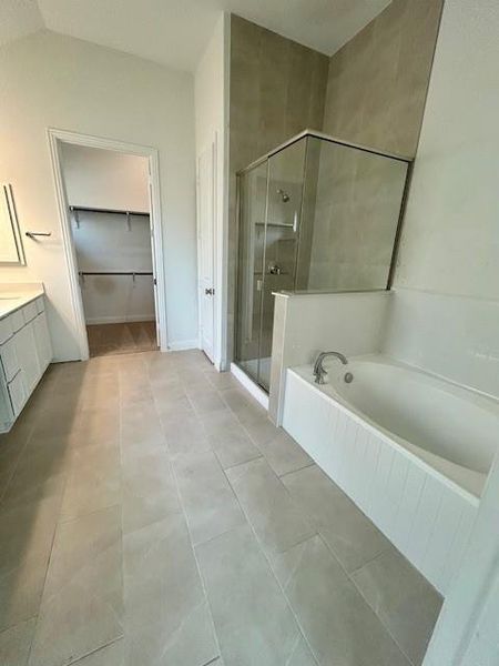 Primary Bath retreat with dual vanities, garden tub & walk-in shower