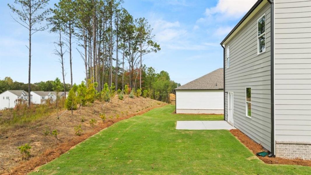 Exterior details and patio area of a home in Parkside at Carter Grove, Cartersville (Image 4).