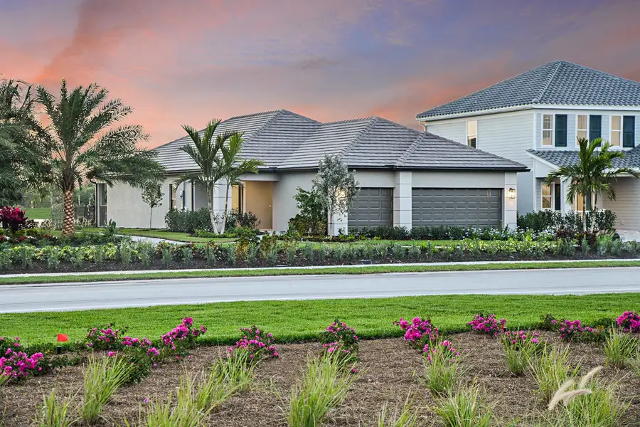 Representative exterior photo of a completed home built from the Meadow Brook by Neal Communities in SkySail, Naples, FL (Image 2).
