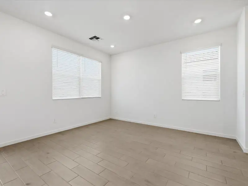 Spacious, unfurnished interior of a new home in Rancho Mirage Estate Series, Maricopa (Image 10).