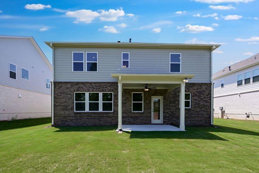 Front exterior of a new home in Bennett Farm, Loganville, GA, highlighting curb appeal (Image 2).