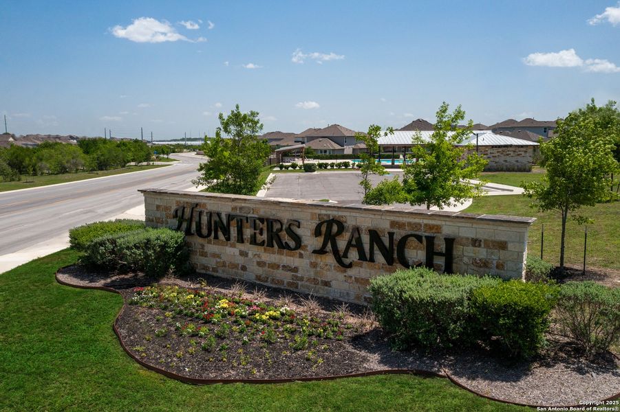Front exterior of a new home in Hunters Ranch, San Antonio, TX, highlighting curb appeal (Image 29).
