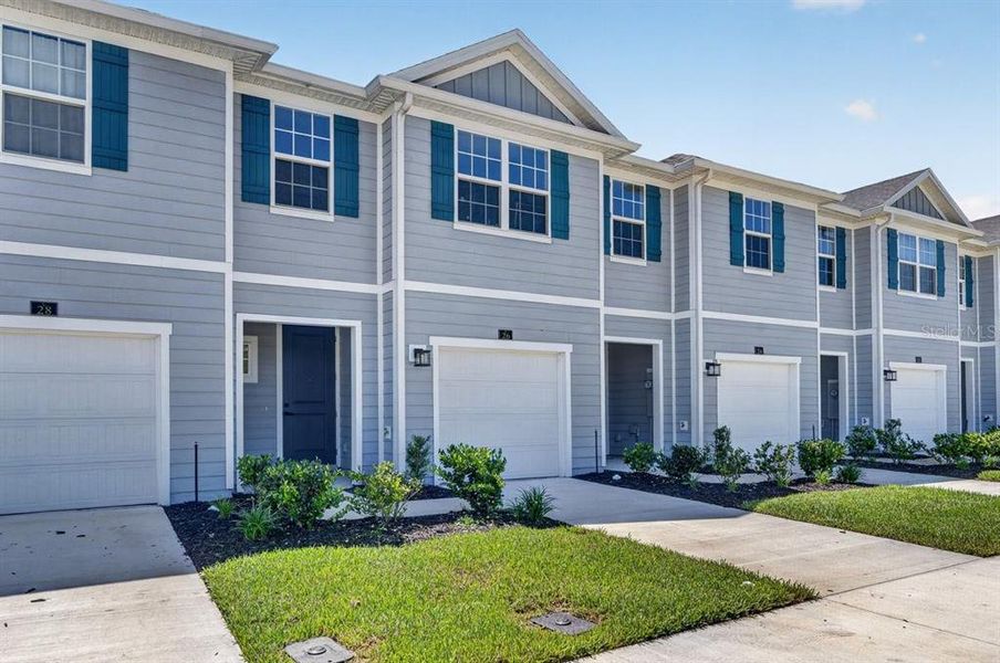 Front exterior of a new home in , Palm Coast, FL, highlighting curb appeal (Image 22).