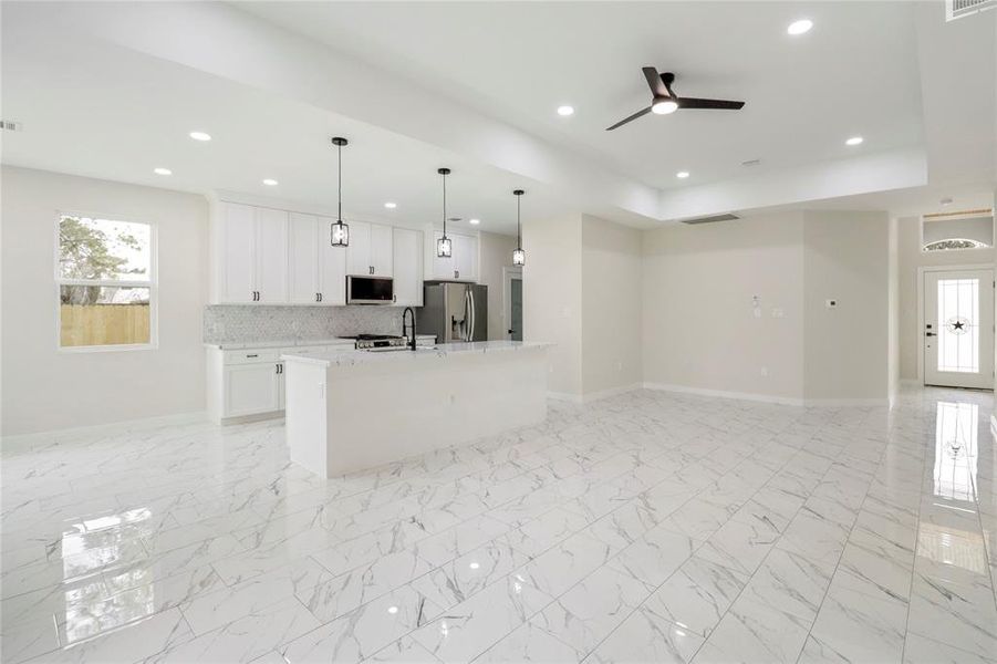 Kitchen is open to the living area.