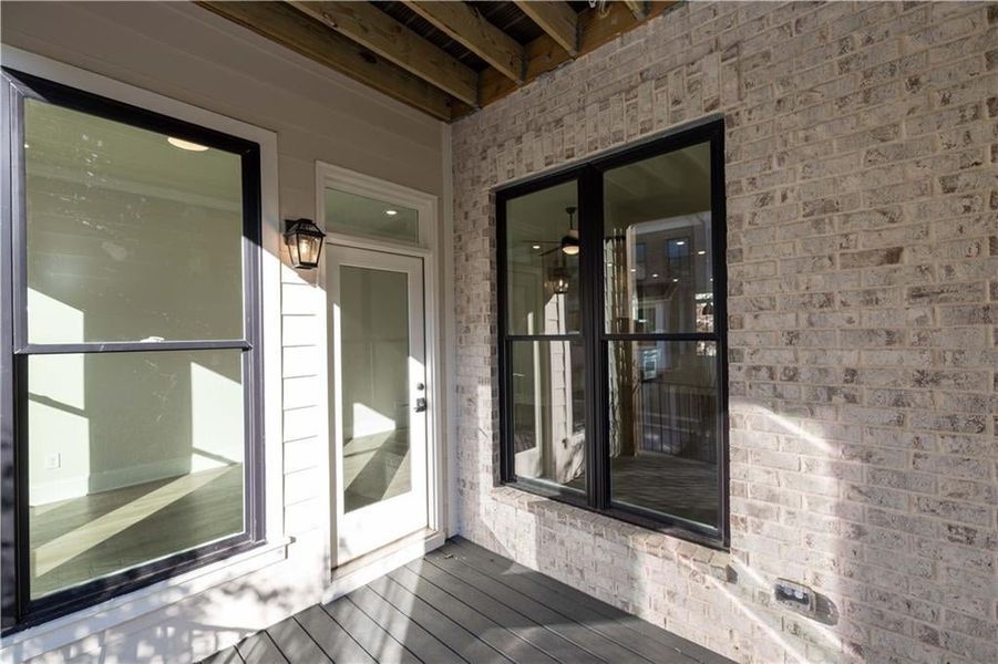 Whether hosting guests or enjoying a quiet morning, this sun-soaked deck provides a peaceful backdrop with open views and privacy.  This photo is from another community and not representative of this homesite.