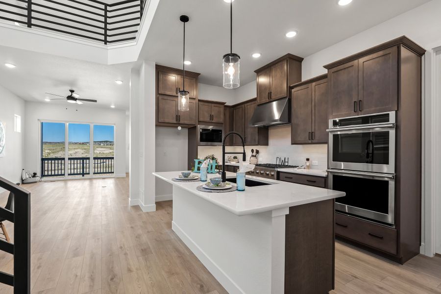 Furnished interior view inside a new home in Revel Crossing at Wolf Ranch - The Panorama Collection, Colorado Springs (Image 9).