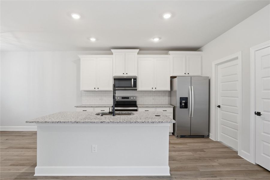 Furnished interior view inside a new home in Whisper Valley, Manor (Image 9).