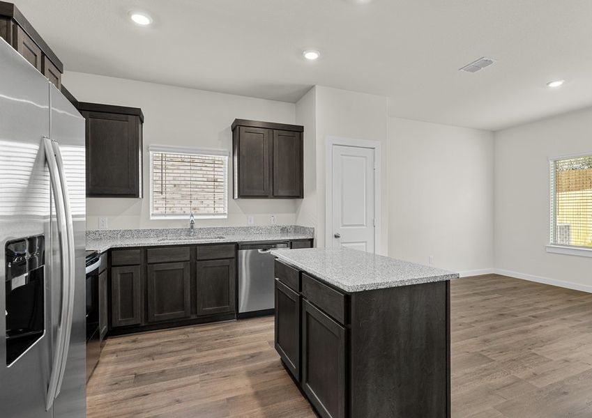 The dining room sits right off of the kitchen.