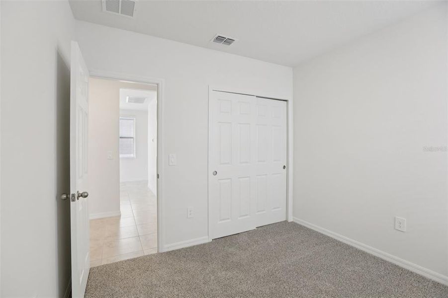 Spacious, unfurnished interior of a new home in Springs at Lake Alfred - Classic Series, Lake Alfred (Image 32).