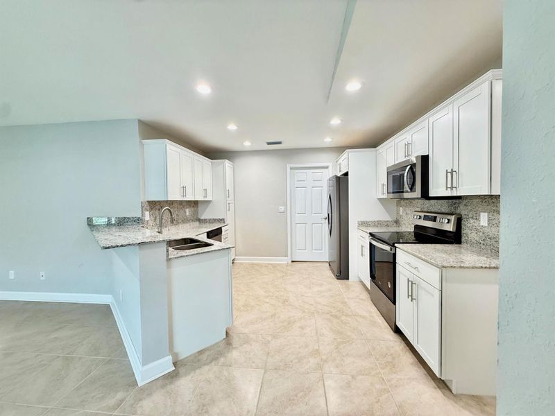 Furnished interior view inside a new home in , Fort Pierce (Image 32).