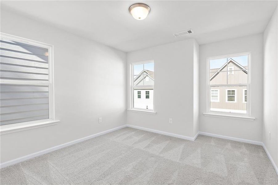 Spacious, unfurnished interior of a new home in The Village at Shallowford, Kennesaw (Image 34).
