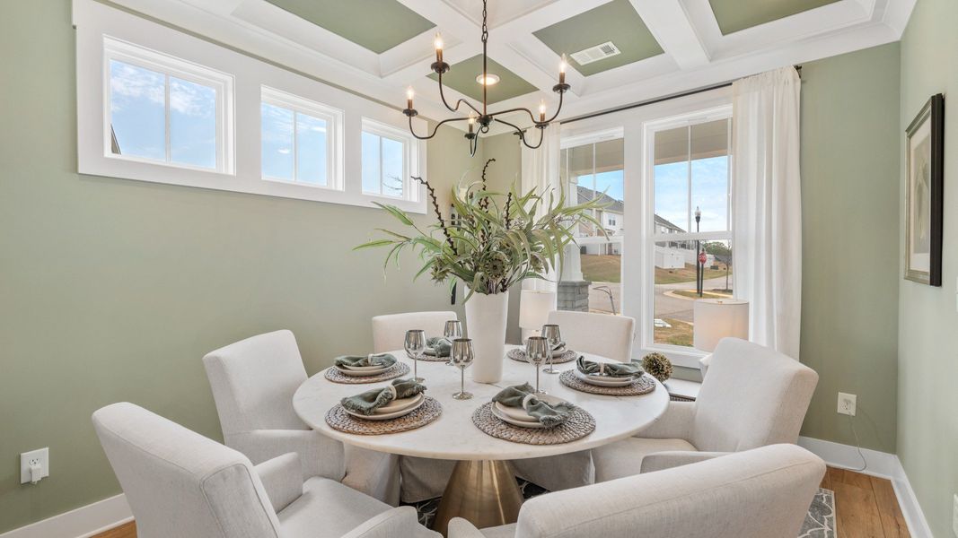 Notable coffered ceiling elevates this accomplished dining room near Downtown Fountain Inn