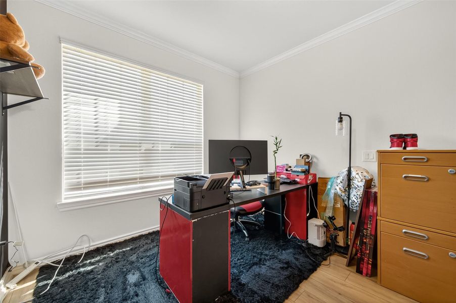 Furnished interior view inside a new home in Sunterra, Katy (Image 13).