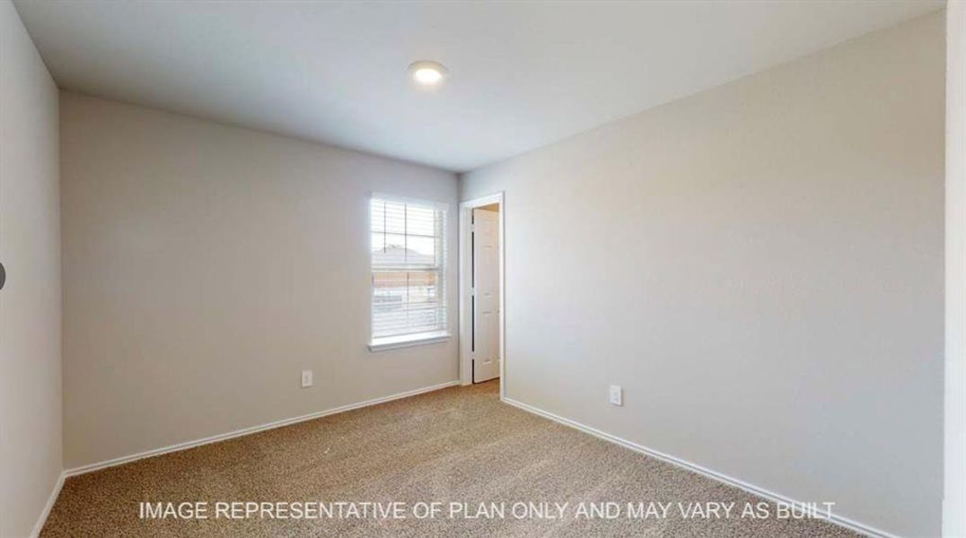 Empty room with light carpet and baseboards