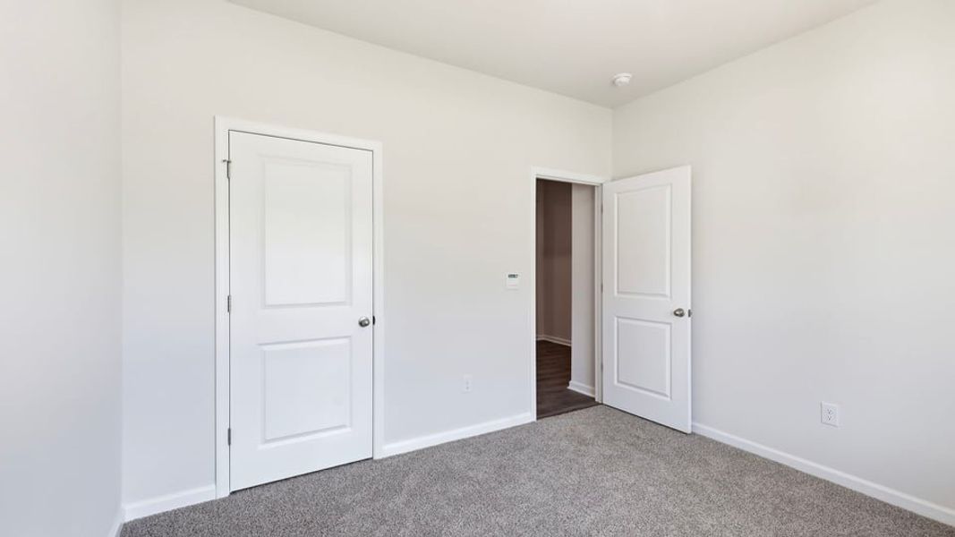 Spacious, unfurnished interior of a new home in Pine Lake Estates, Anderson (Image 21). Spacious, unfurnished interior of a new home in Pine Lake Estates, Anderson (Image 21).