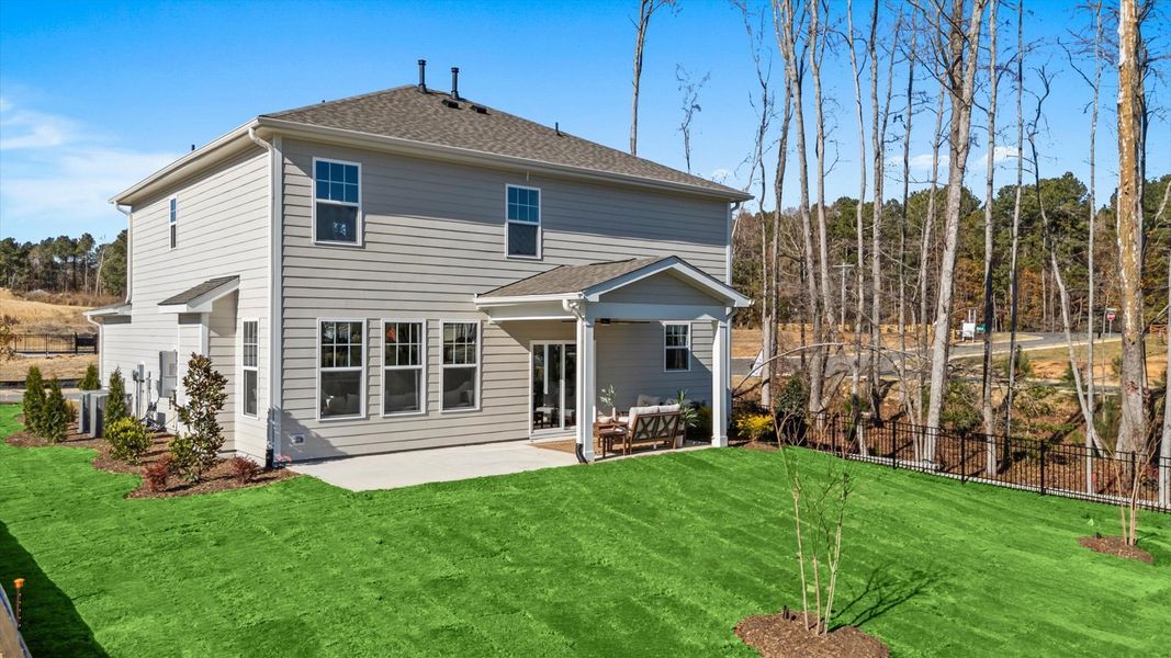 Representative exterior photo of a completed home built from the Wynwood by DRB Homes in Whispering Pines, Franklinton, NC (Image 27). Representative exterior photo of a completed home built from the Wynwood by DRB Homes in Whispering Pines, Franklinton, NC (Image 27).