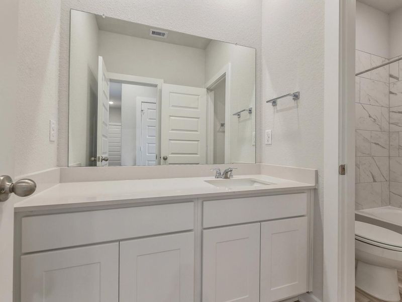 Furnished interior view inside a new home in Windmill Estates, Magnolia (Image 11).