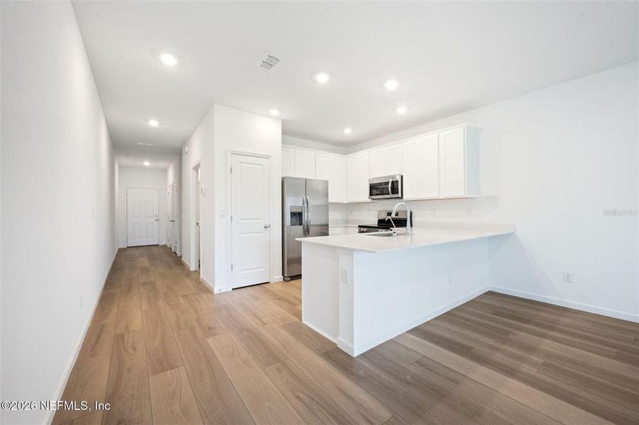 Furnished interior view inside a new home in , Orange Park (Image 6).