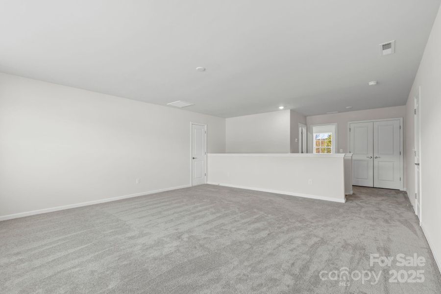 Spacious, unfurnished interior of a new home in Bell Farm: 60's, Statesville (Image 23).