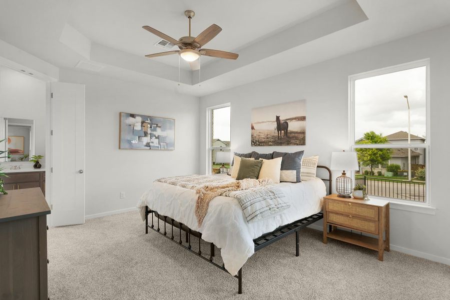 Representative furnished interior of a home built from the Wilson by Chesmar Homes in Deerbrooke Cottages, Leander (Image 9).