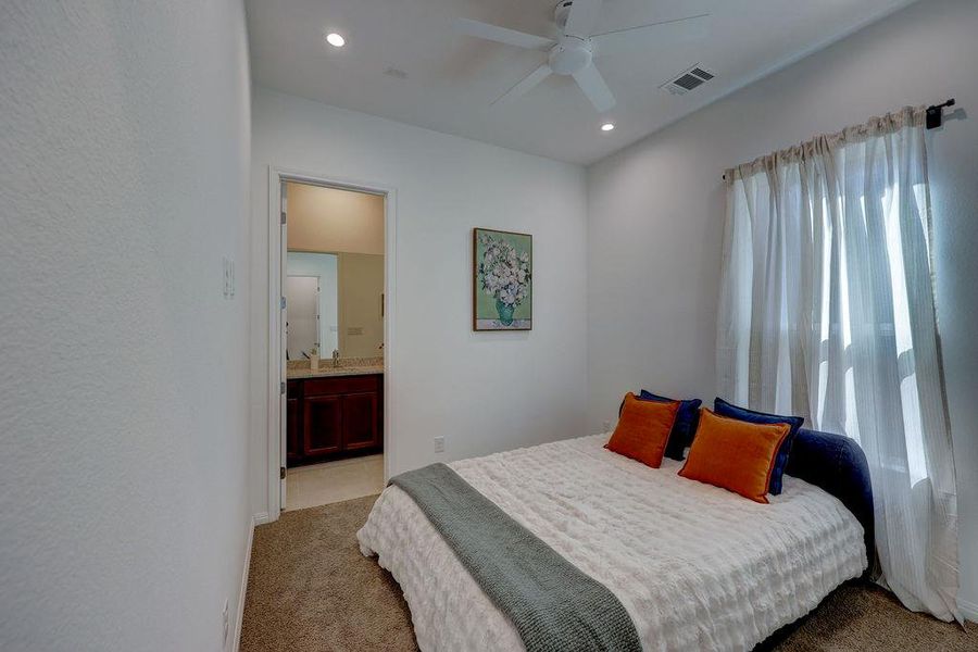 1st floor fan, recessed lighting, and ensuite bathroom