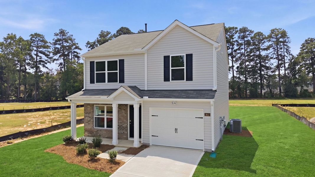Front exterior of a new home in Jetstream Park, Wilson, NC, highlighting curb appeal (Image 17). Front exterior of a new home in Jetstream Park, Wilson, NC, highlighting curb appeal (Image 17).