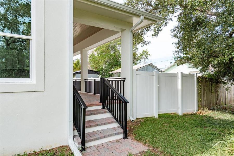 Front exterior of a new home in , Tarpon Springs, FL, highlighting curb appeal (Image 1).