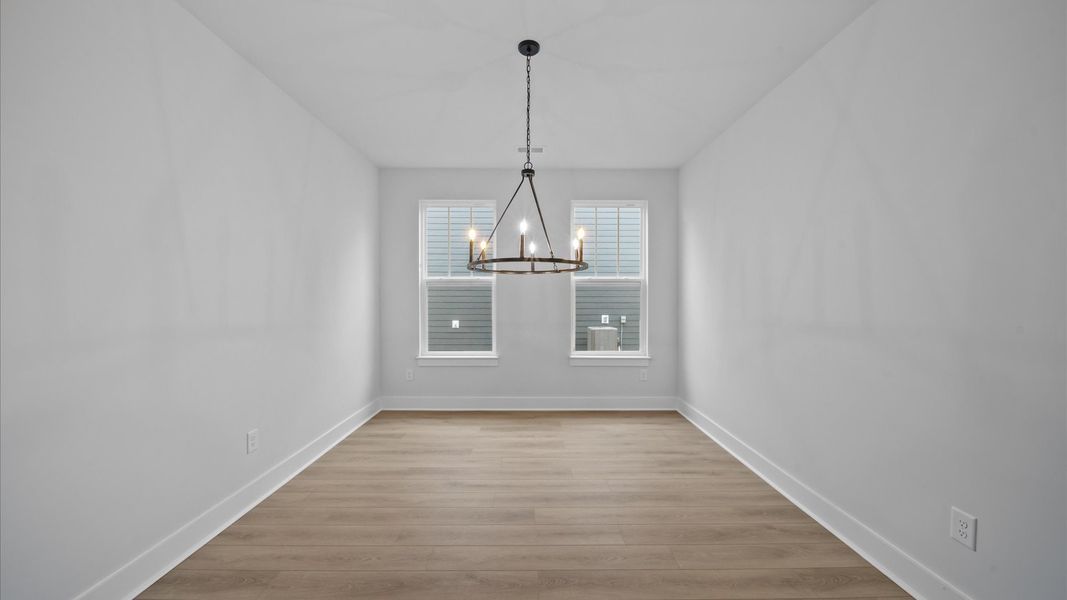 Elegant dining room opens to a functional floor plan with tasteful upgrades throughout Elegant dining room opens to a functional floor plan with tasteful upgrades throughout