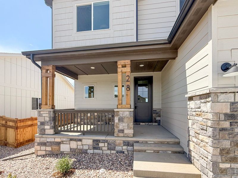 Exterior details and patio area of a home in Greenspire At Windsor Lake, Windsor (Image 3).