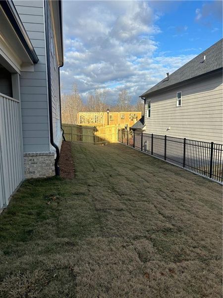 Exterior details and patio area of a home in , Buford (Image 34). Exterior details and patio area of a home in , Buford (Image 34).