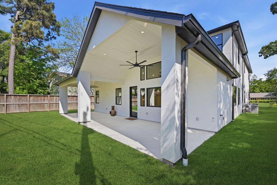 Exterior details and patio area of a home in , Houston (Image 3).