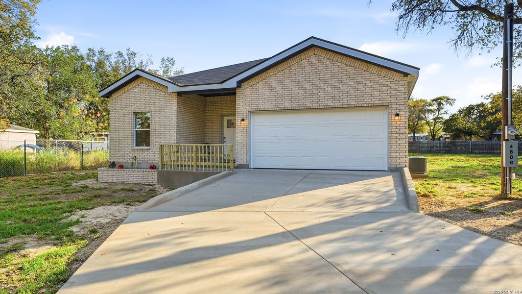Front exterior of a new home in , Elmendorf, TX, highlighting curb appeal (Image 23). Front exterior of a new home in , Elmendorf, TX, highlighting curb appeal (Image 23).