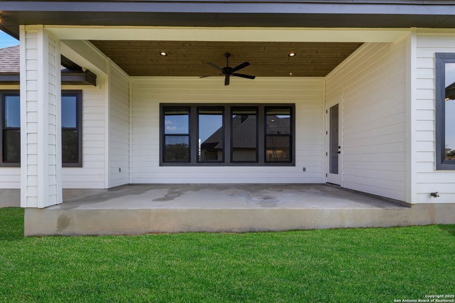 Exterior details and patio area of a home in , Castroville (Image 4).