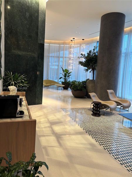 Elegant Lobby with Curated Art and Designer Furnishings