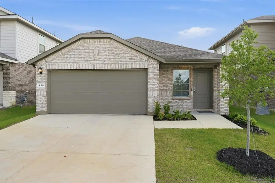 Front exterior of a new home in , Denton, TX, highlighting curb appeal (Image 1). Front exterior of a new home in , Denton, TX, highlighting curb appeal (Image 1).