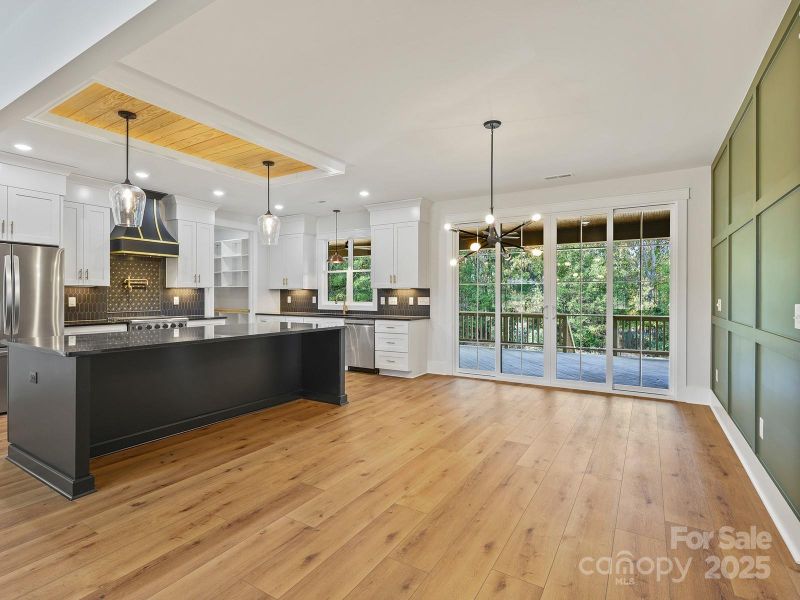 Kitchen/Dining Area with Quad-Sliding Doors