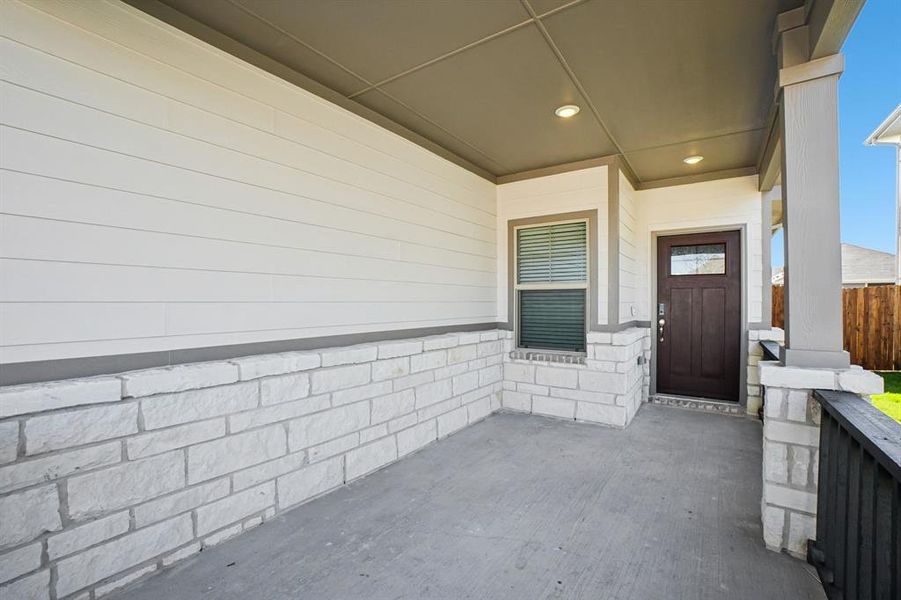 Exterior details and patio area of a home in Trails of Lavon - Spring Series, Lavon (Image 28).