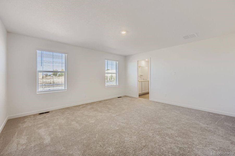Spacious, unfurnished interior of a new home in Percheron: The Camden Collection, Colorado Springs (Image 11).