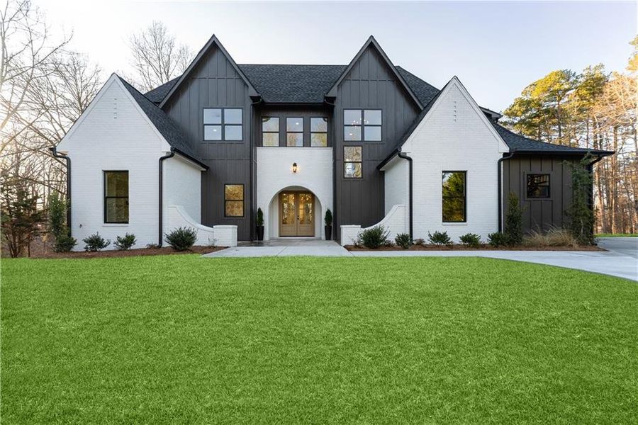 Front exterior of a new home in , Cumming, GA, highlighting curb appeal (Image 34).