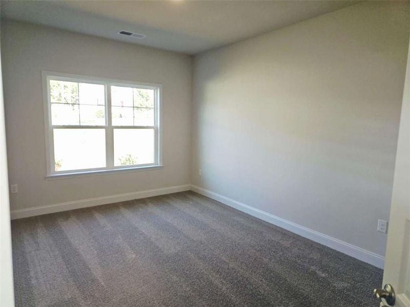 Spacious, unfurnished interior of a new home in Scarlett Place, Bowdon (Image 7).