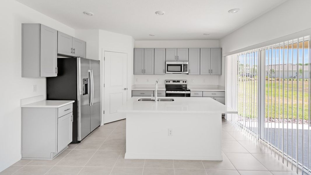 Representative furnished interior of a home built from the Ambrosia by Taylor Morrison in Aden South at Westview, Kissimmee (Image 2).